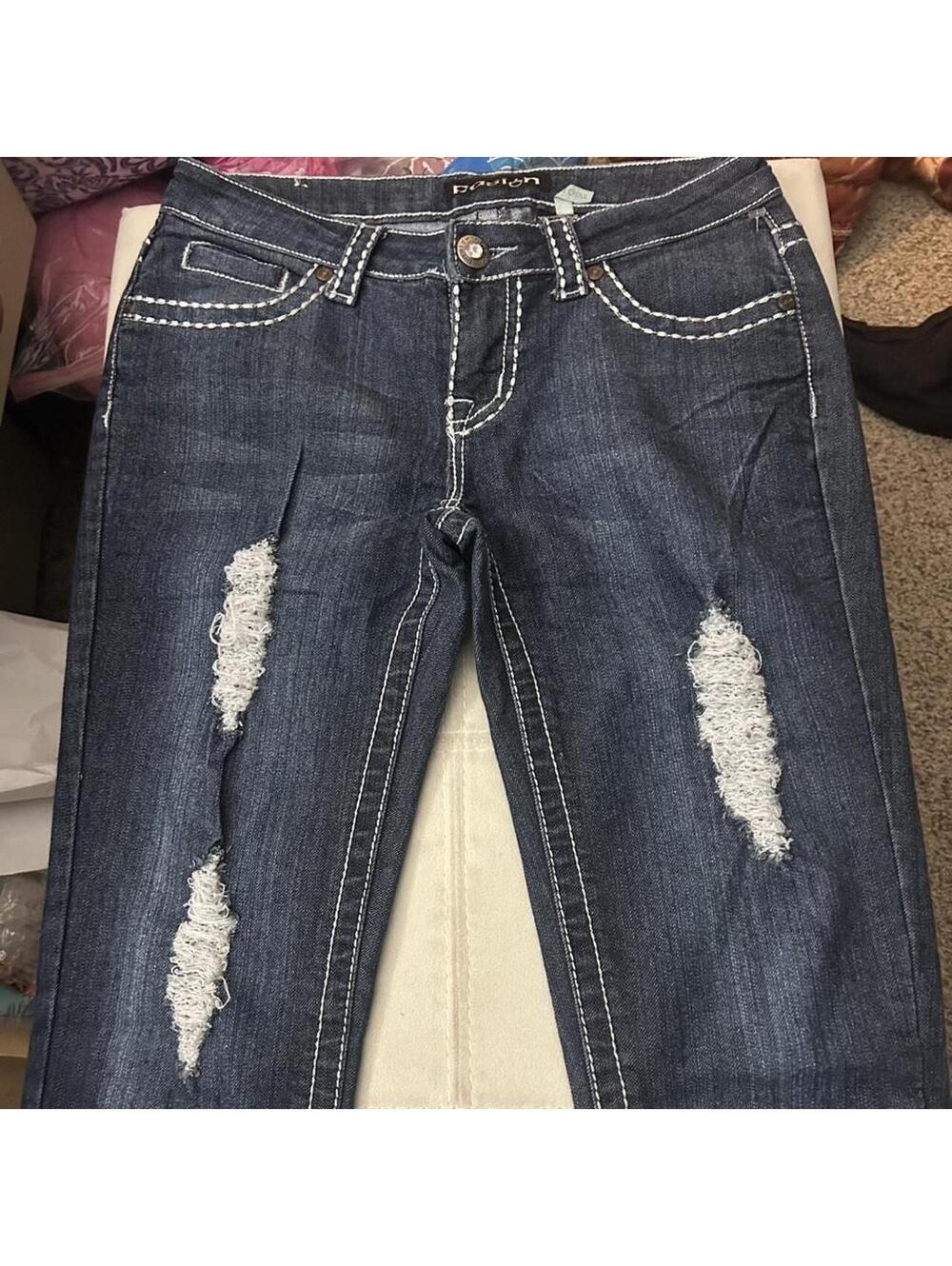 Pasion navy blue low rise bootcut jeans with white stitching. Size: 5